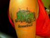 tractor tattoo on arm